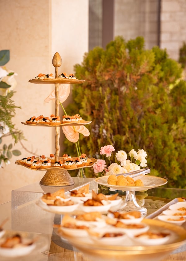 Small bites on tiered stands at the buffet