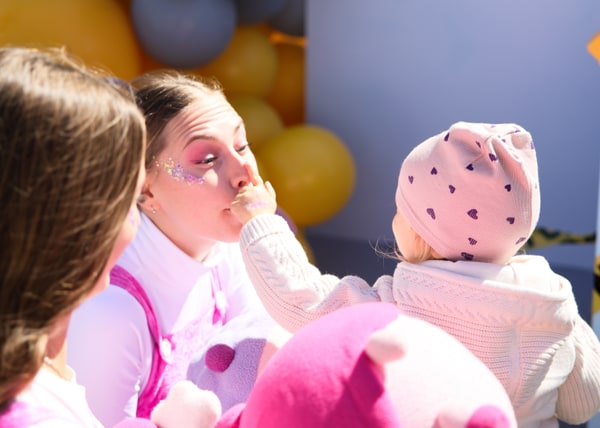 Entertainers playing with children at the birthday party
