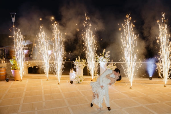 Bright fountains of sparks surrounding the couple’s evening dance