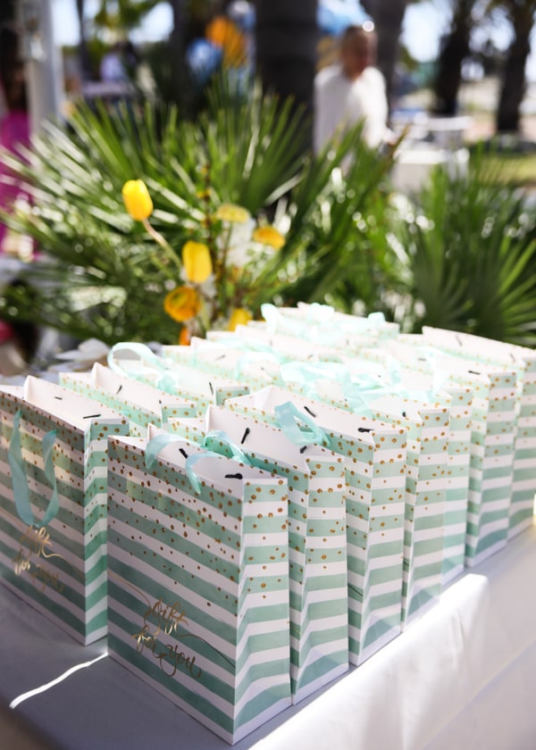 Rows of small party favour boxes on the table