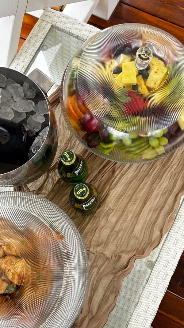 Food under glass covers on the picnic table