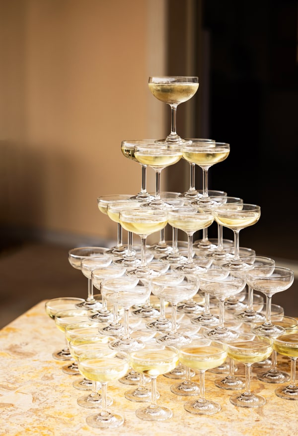 A tower of glasses at the birthday reception