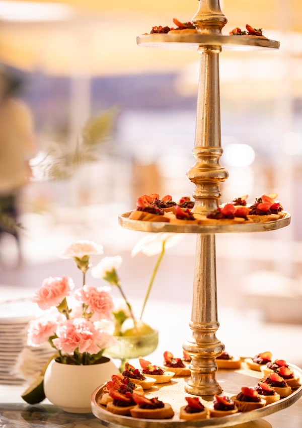 Small bites on tiered stands at the buffet