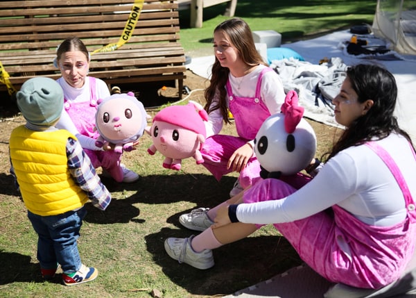 Entertainers playing with children at the birthday party