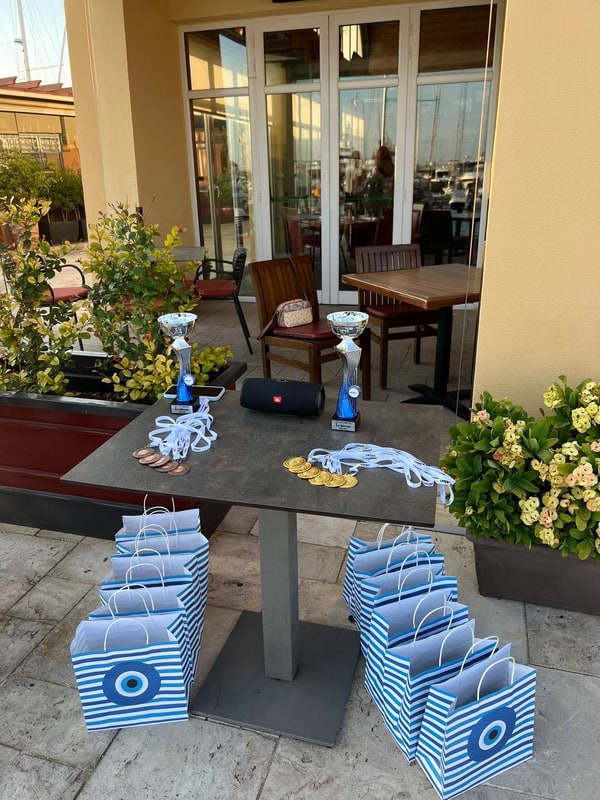 Gift bags arranged around an outdoor table
