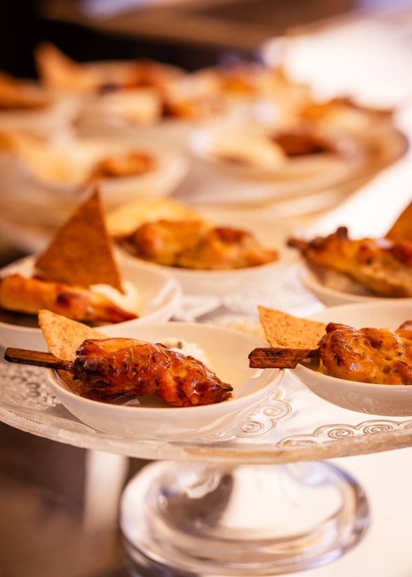 Small bites on tiered stands at the buffet