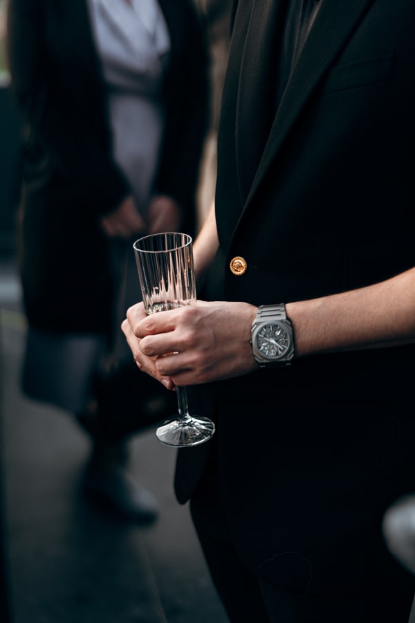 Guests greeting, toasting and celebrating together
