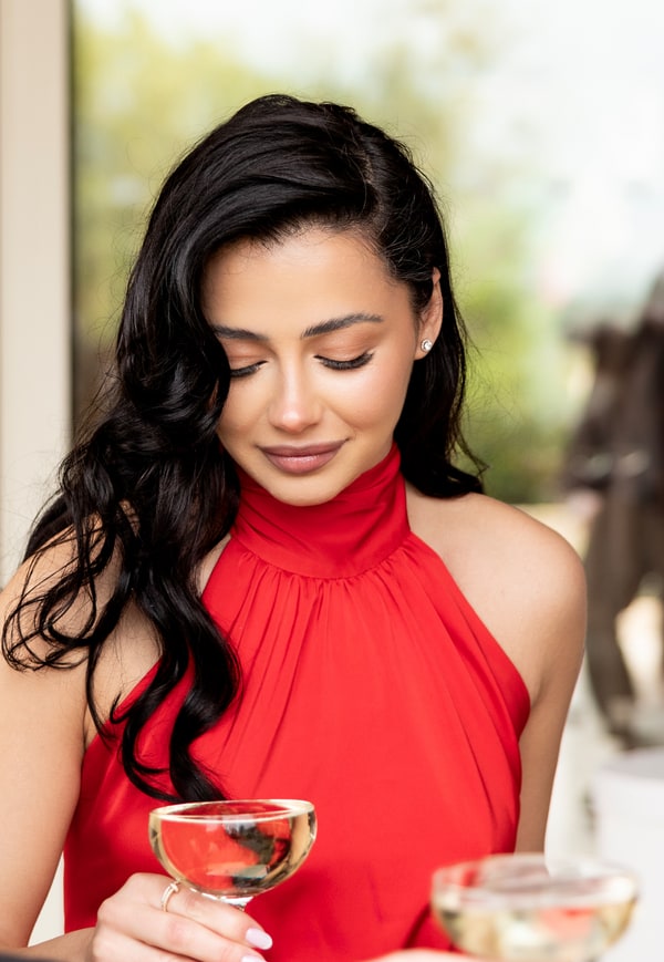 A birthday portrait of a woman in an evening dress