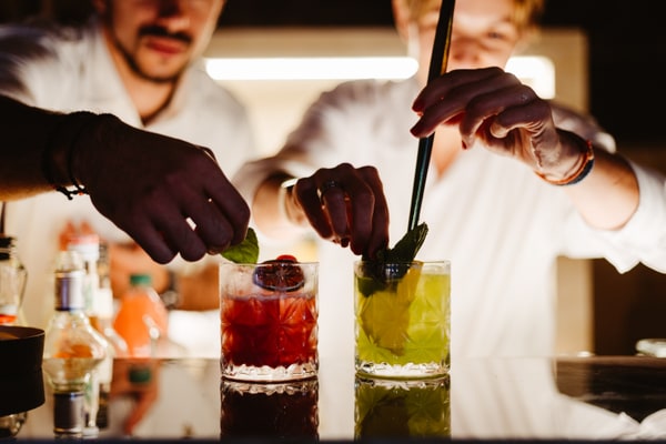 Bartenders preparing cocktails for the celebration