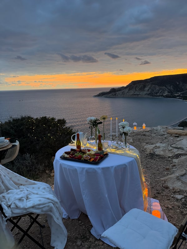 The picnic table overlooking the bay at sunset