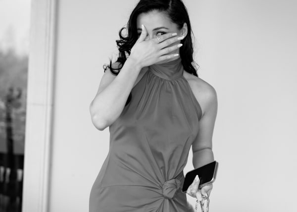 A birthday portrait of a woman in an evening dress